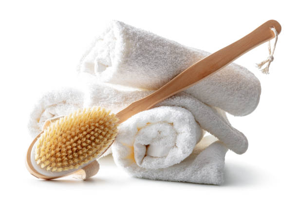 Bath: Towels and Bath Brush Isolated on White Background Bath: Towels and Bath Brush Isolated on White Background back brush stock pictures, royalty-free photos & images