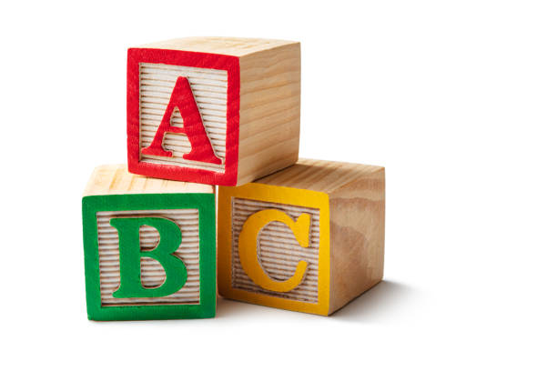 brinquedos: blocos de alfabeto - abc isolado em fundo branco - block toy education alphabet - fotografias e filmes do acervo