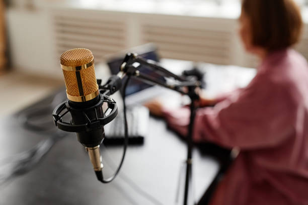 Woman in Podcast Studio Background