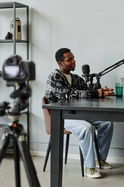 istock Black Man Recording Video Podcast 1358087482