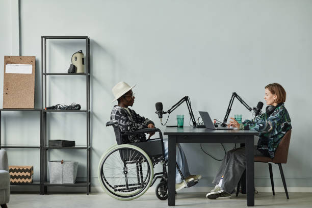 istock Man with Disability Recording Podcast 1358087495