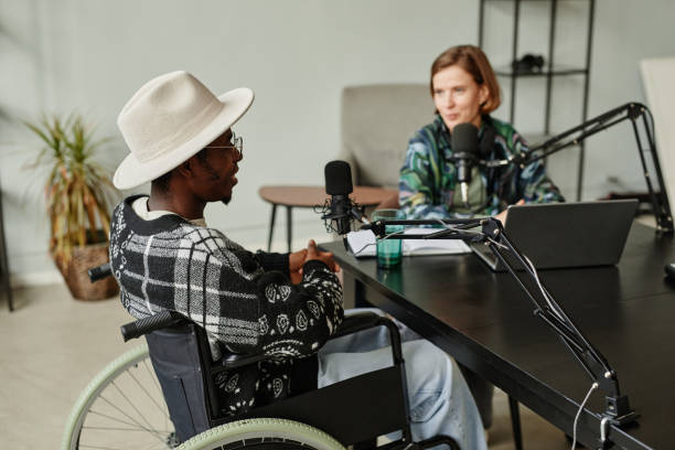istock Man with Disability Recording Podcast 1358087502