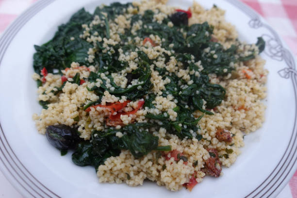 Tabbouleh and spinach cooked as an appetizer  Meal served