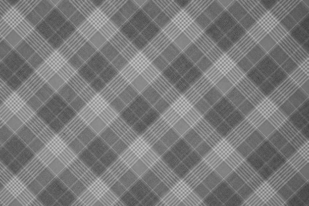 Black and white checkered pattern fabric background. stock photo