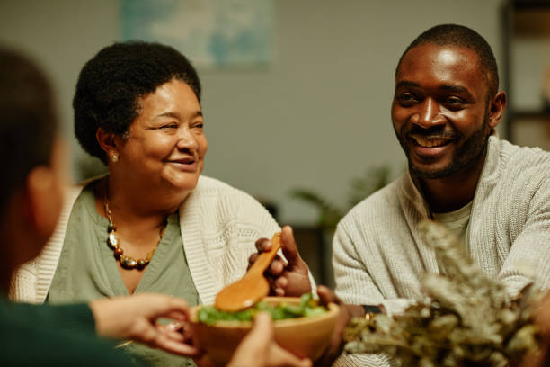 istock Happy African American Family at Dinner 1358090823