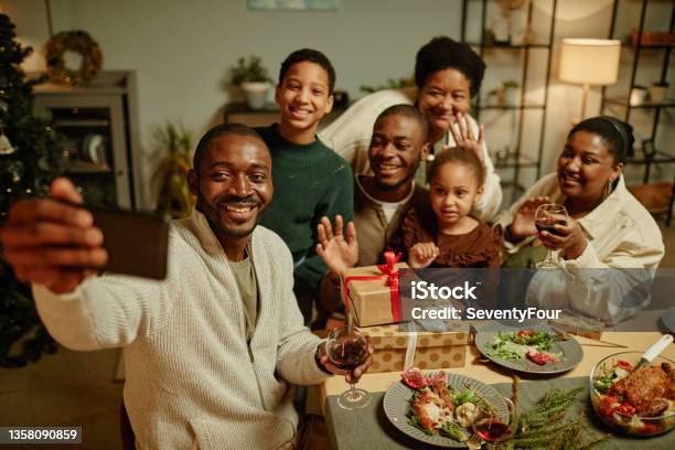 African American Family Taking Selfie At Christmas Stock Photo - Download Image Now - Family, Holiday - Event, Christmas