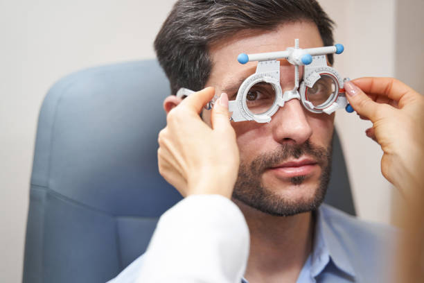 istock Oculist performing side angle adjustment of trial frame 1358091514