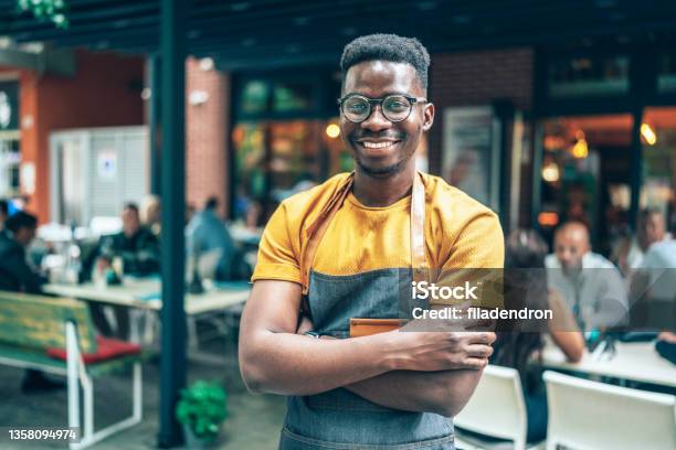 Cheerful Barista Stock Photo - Download Image Now - Franchising, Bartender, Waiter