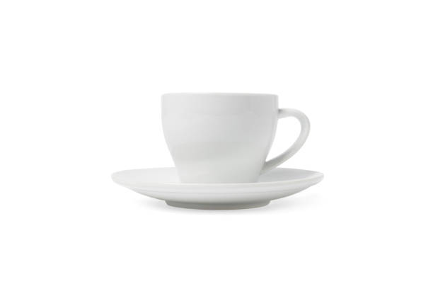 istock White cup and saucer isolated on white background. Ceramic coffee cup or tea mug and dish for drink close up. Mock up classic porcelain utensils 1358095982