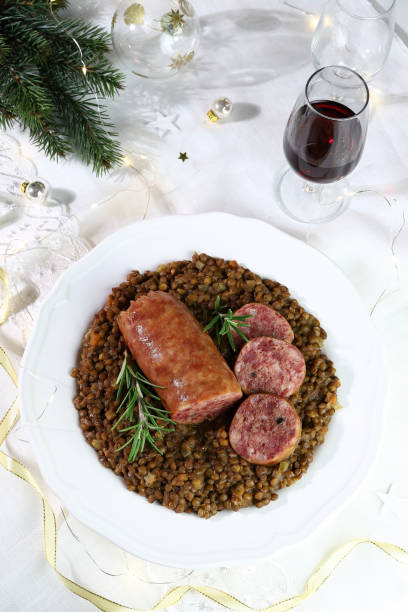 cotechino with lentils. christmas and holiday season. - cooked vertical high angle view lentil imagens e fotografias de stock