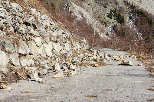 Rockfall and landslide in the abandoned mountain road..