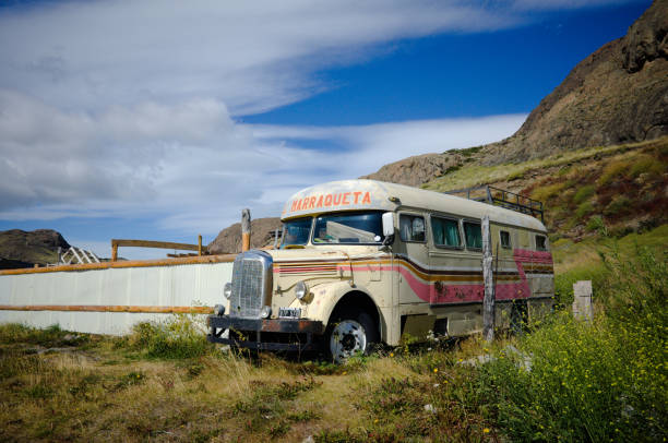 Old 1940s Mercedes Benz Bus El Chalten, Santa Cruz, Argentina - March, 2020: Abandoned bus with rust remade into house on wheels.  Old 1940s Mercedes Benz Bus with La Marraqueta inscription located in Argentinian Patagonia. mercedes argentina stock pictures, royalty-free photos & images