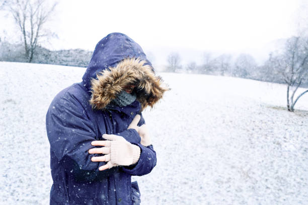 One man sensitive to cold freezing outdoor in the snow