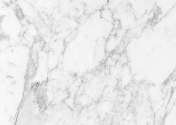 istock White marble texture background pattern top view. Tiles natural stone floor with high resolution. Luxury abstract patterns. Marbling design for banner, wallpaper, packaging design template 1358101567