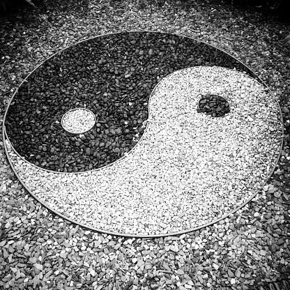 Yin and yang symbol made of gravel