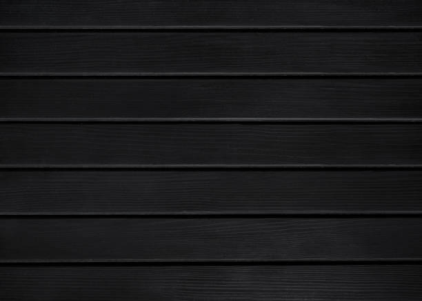 istock Black wood color texture horizontal for background. Surface light clean of table top view. Natural patterns for design art work and interior or exterior. Grunge old white wood board wall pattern 1358102756
