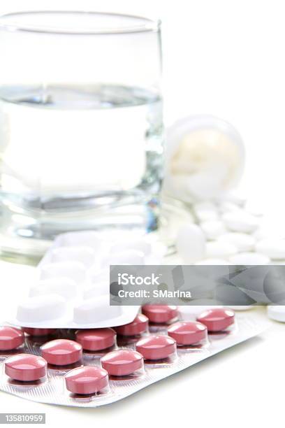 Different Pills And Glass Of Water Stock Photo - Download Image Now - Blister, Capsule - Medicine, Circle