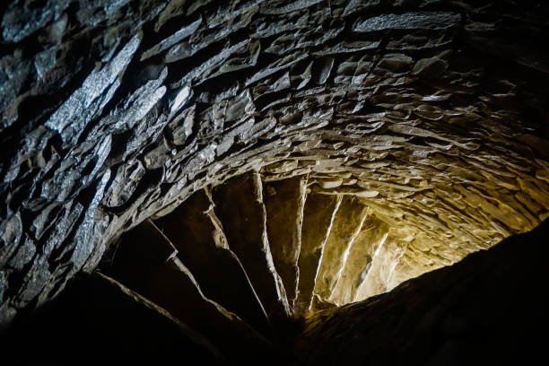 istock Spiral staircase in an ancient stone minaret 1358110515