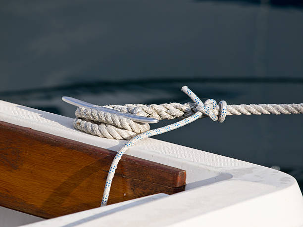 веревки - moored nautical vessel tied knot sailboat стоковые фото и изображения
