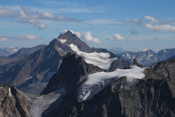 istock Mountains Fuenffingerstoecke and Fleckistock. View from Mount Titlis, Obwalden. 1358112203