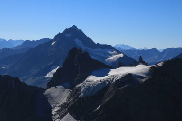 istock Fuenffingerstoecke and Fleckistock, high mountains in summer. 1358112211