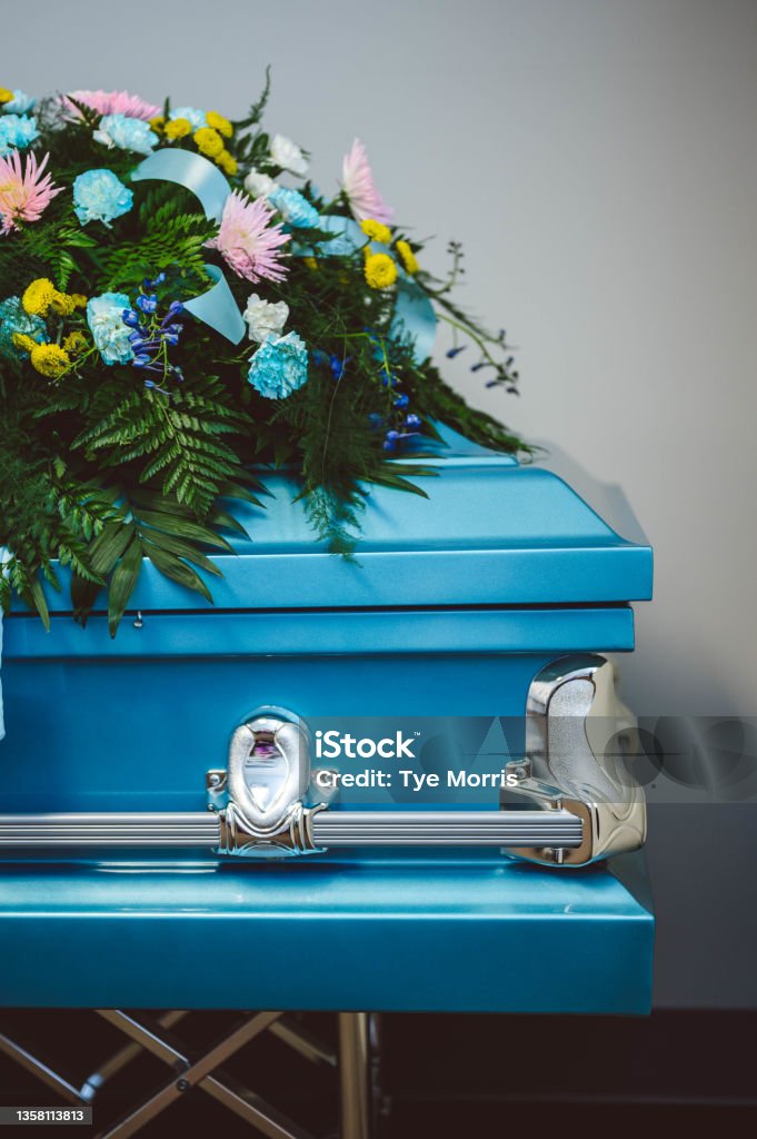 A casket with flowers a casket with flowers Funeral Stock Photo
