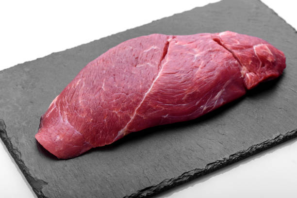 raw fresh chuck roll steak with herbs and salt on a cutting board - mandril imagens e fotografias de stock