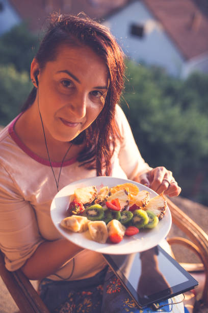 istock Woman works from home on terrace 1358115245