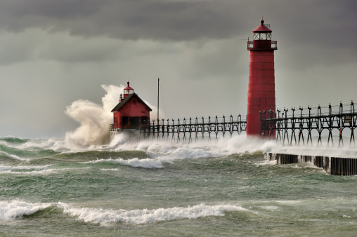 Gale force winds pound the the Grand Haven Lighthouse. Grand haven , Michigan USA