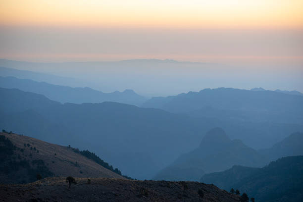 Layer of mountains seen from Pico de Orizaba base camp at sunset in Citlaltépec, Ver., Mexico
