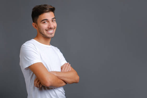 istock Satisfied caucasian guy looking at camera with a big laugh 1358119455