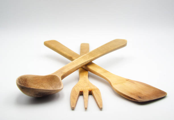 Wooden food spatula on a white background