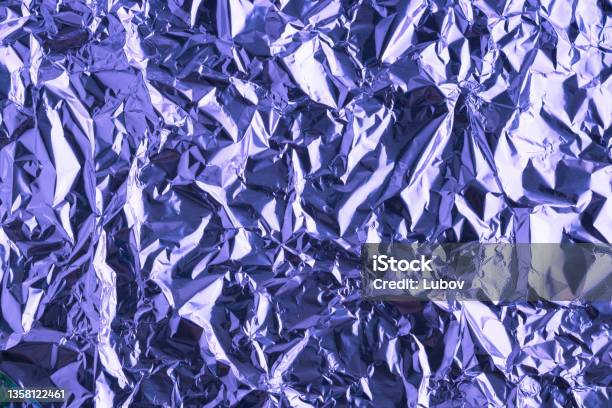 Aluminum foil with multi-colored illumination . Background and