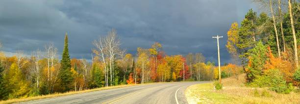 Colorful Autumn Views on a Curved Road stock photo