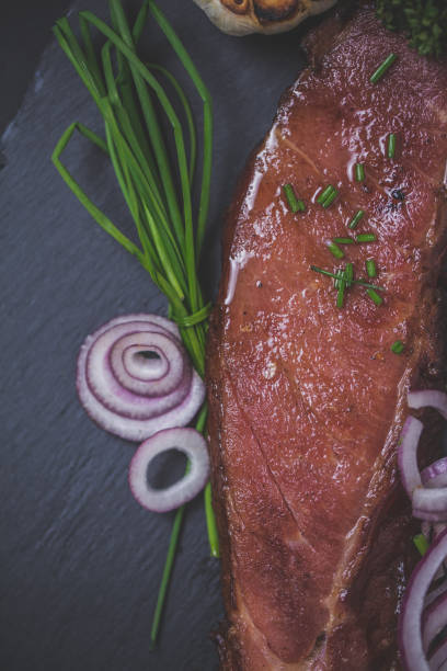 Grilled beef steak on slate plate