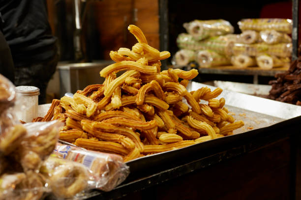 istock Sale of churros. 1358126062