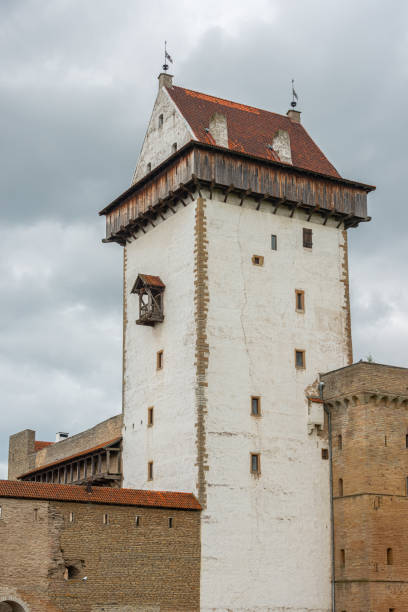 Narva, Estonia - 11.08.2020: Hermann Castle (Hermannsfeste) on the bank of The Narva (Narova) River next to the border of Russian Federation.