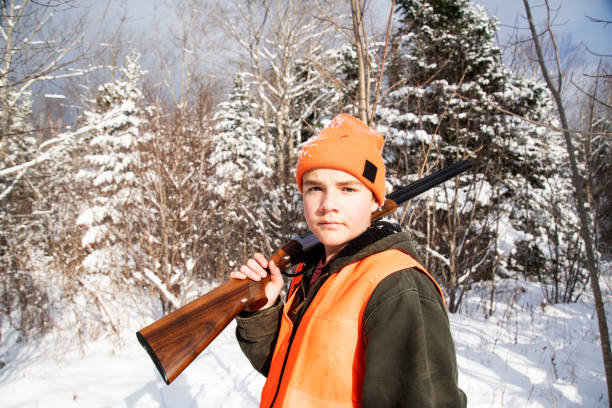 istock A teen hunter in the winter 1358131014