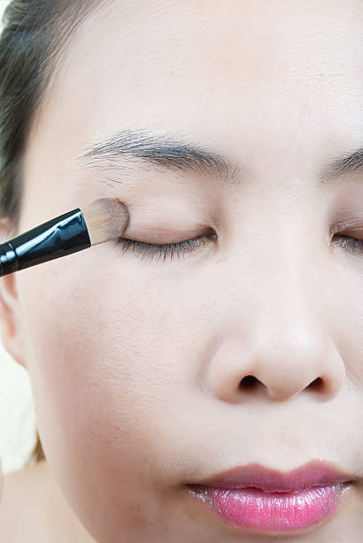 istock Asian young woman make up. 135813135