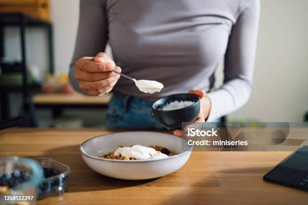 Close Up Of Woman Hands Making Healthy Breakfast In Kitchen Stock Photo - Download Image Now