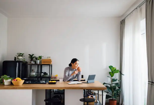 Photo of Happy Business Woman Working from Home