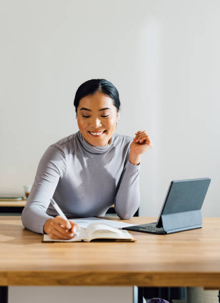 istock Happy Business Woman Working from Home 1358132477