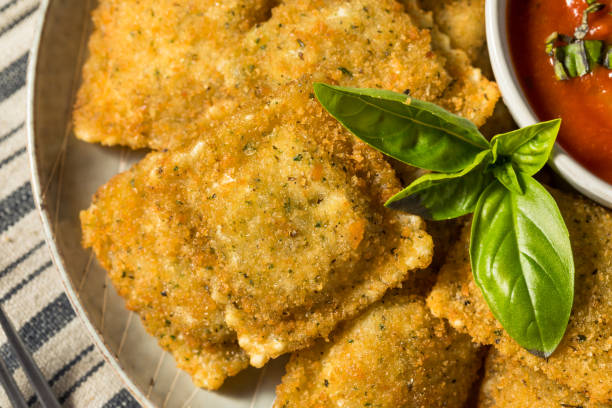 istock Homemade Fried Raviolis with Basil 1358135139