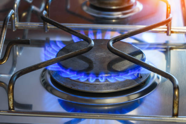 istock Natural gas burner with blue flames 1358138989