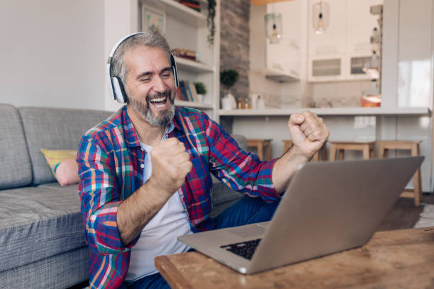 istock Mature man freelancing from home 1358148510