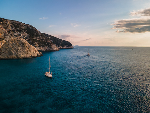 aerial view of chats in the bay sunset above the ionian sea