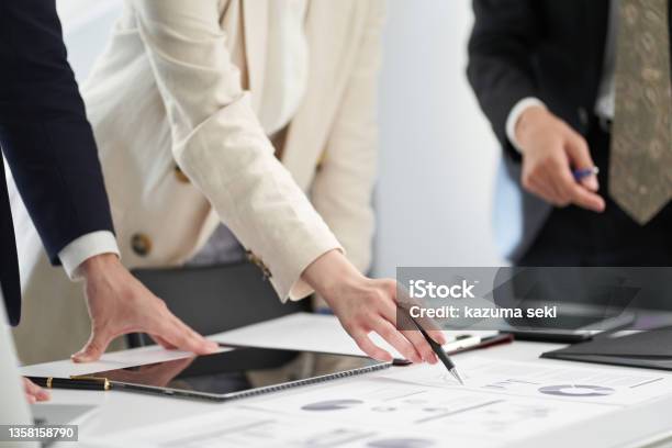 Asian Business Person Having A Meeting Stock Photo - Download Image Now - Obscured Face, Meeting, Business Meeting