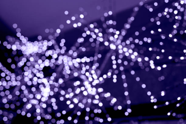 istock Defocused Violet abstract bokeh lights background. Blurred 1358160011