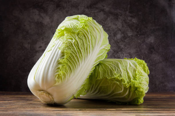 istock fresh chinese cabbage on wood background 1358162801