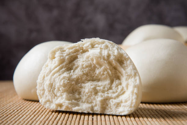 istock Chinese food half steamed bun close up on table. 1358165546